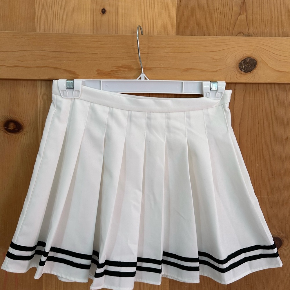 White A-Line Pleated Skirt with Black Ribbon Stripes